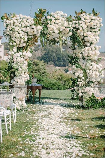 Photo: A wedding lavished in florals and elegant lighting ideas you